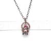 CAULDRON PENDANT WITH RAW PINK TOURMALINE